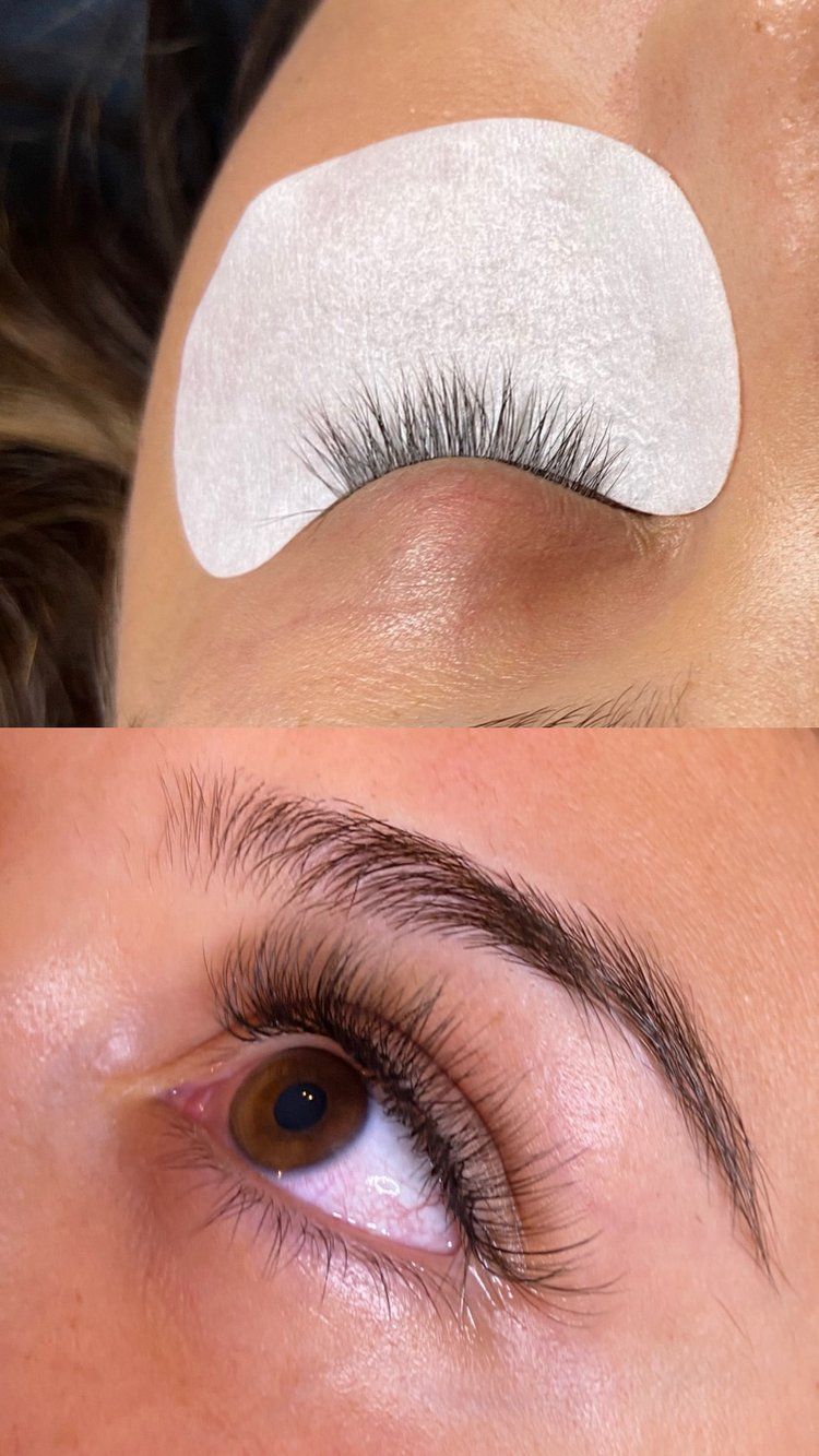 A close up of a woman 's eye with false eyelashes.