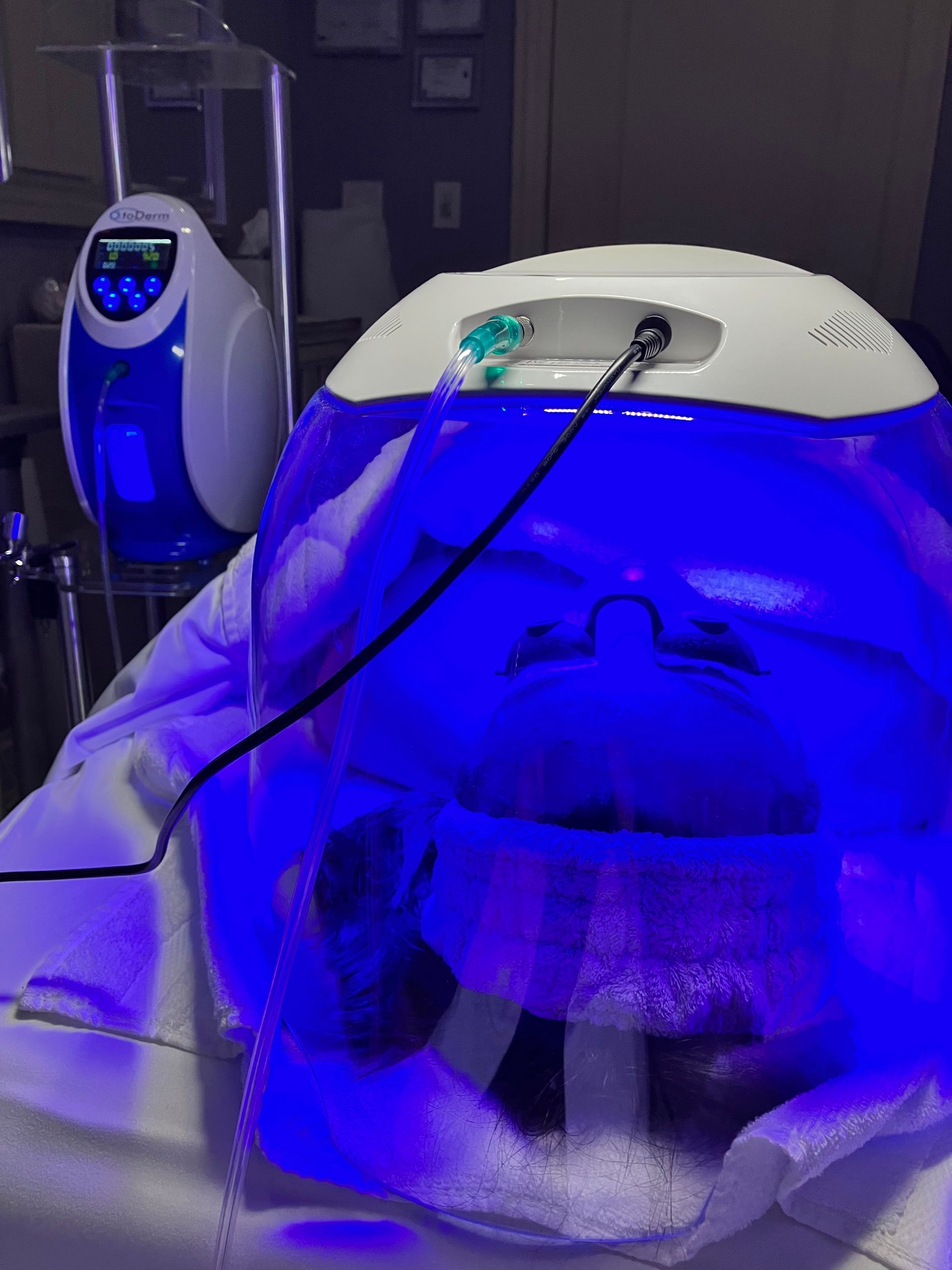 A blue and white device is sitting on a table