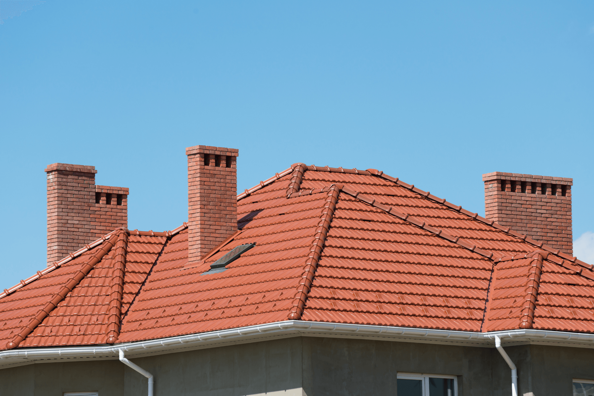 shingles on a large roof by ACE