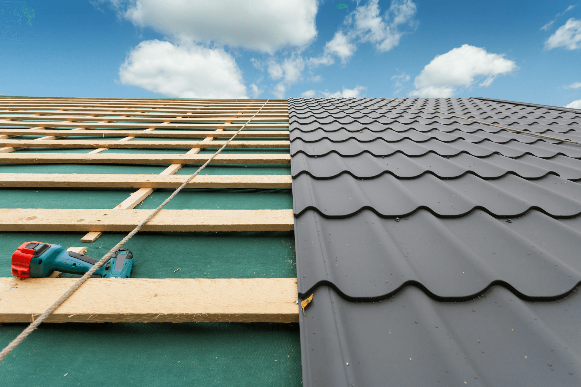 ace installing large shingles to wooden roof frame