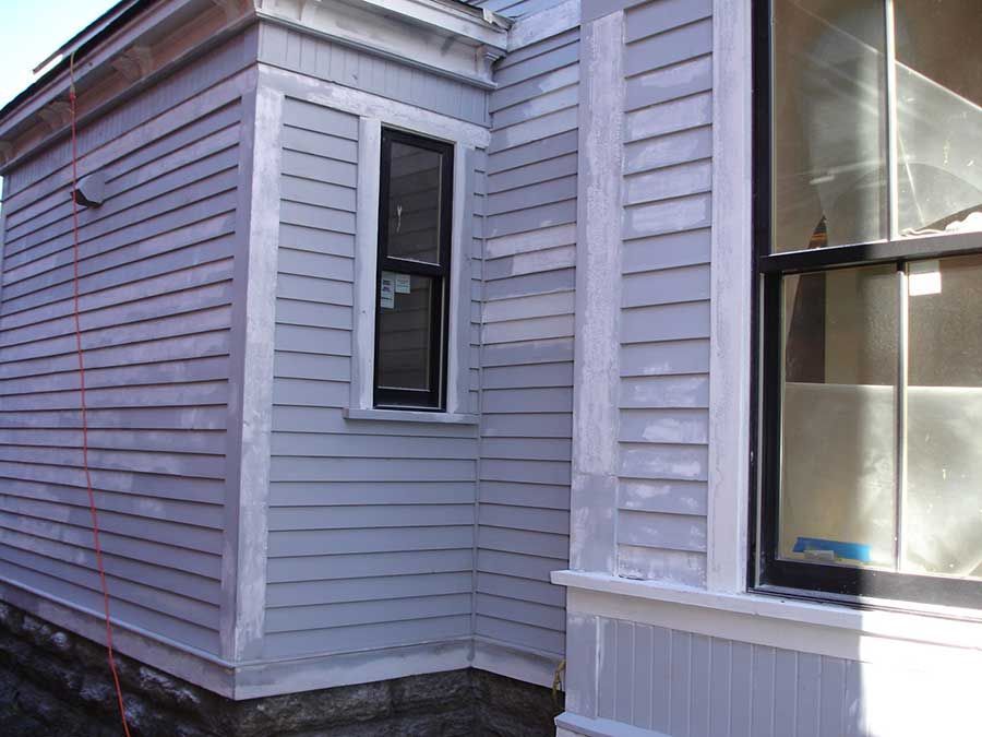 A house with a window on the side of it