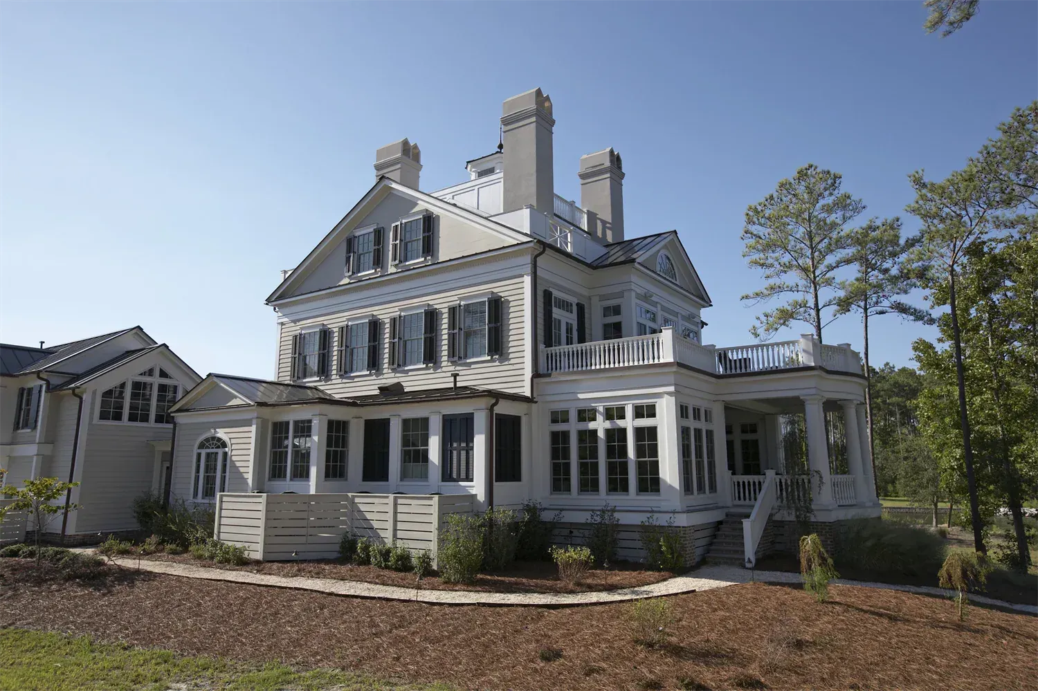 A large white house with a lot of windows
