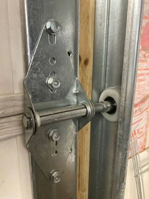 Close up of garage door roller