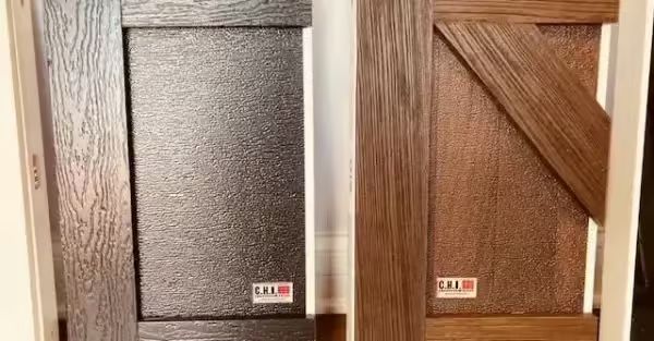Two wooden-look shutters: one dark gray, one brown with a diagonal brace, side-by-side against a white background.
