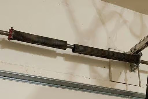Close up of a garage door spring