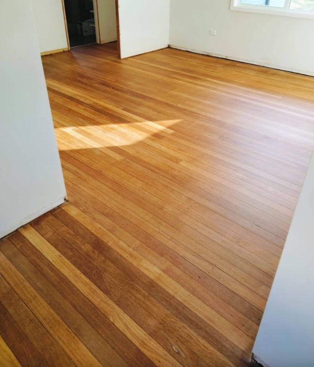 Empty Room With Wooden Floor — Home Improvement Services in Maitland, NSW