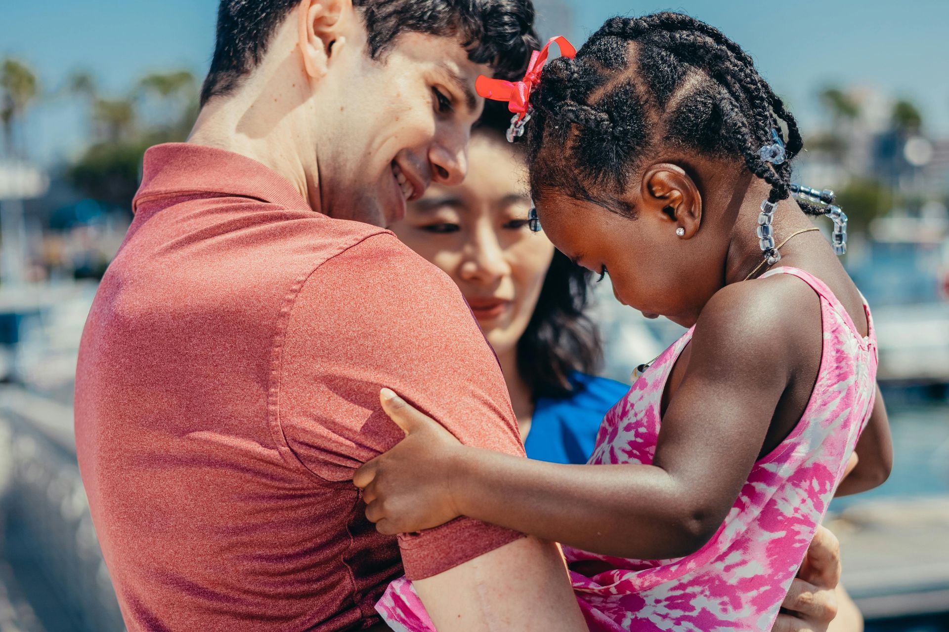 A Foster Child receiving the support of her foster parents.