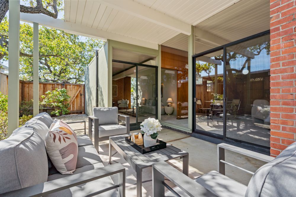 Private backyard with patio and garden vignettes, presented by Rumana Jabeen & Associates to illustrate lifestyle buyers seek and sellers can confidently showcase.