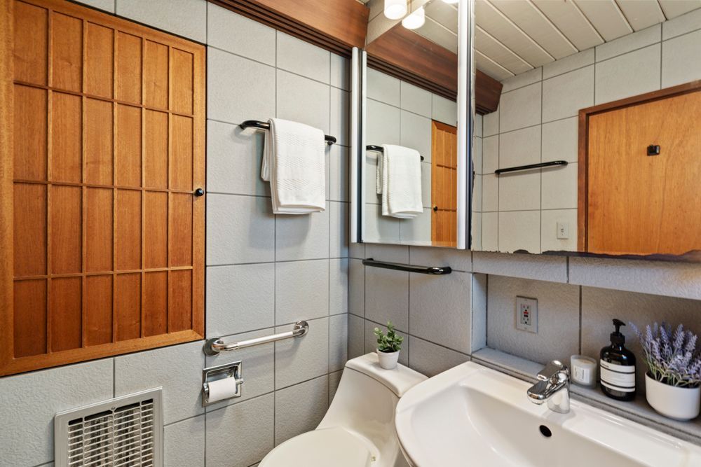 Calm primary bedroom with patio views, dual closets, and ensuite bath — Rumana Jabeen & Associates emphasize comfort for buyers and marketing strength for sellers