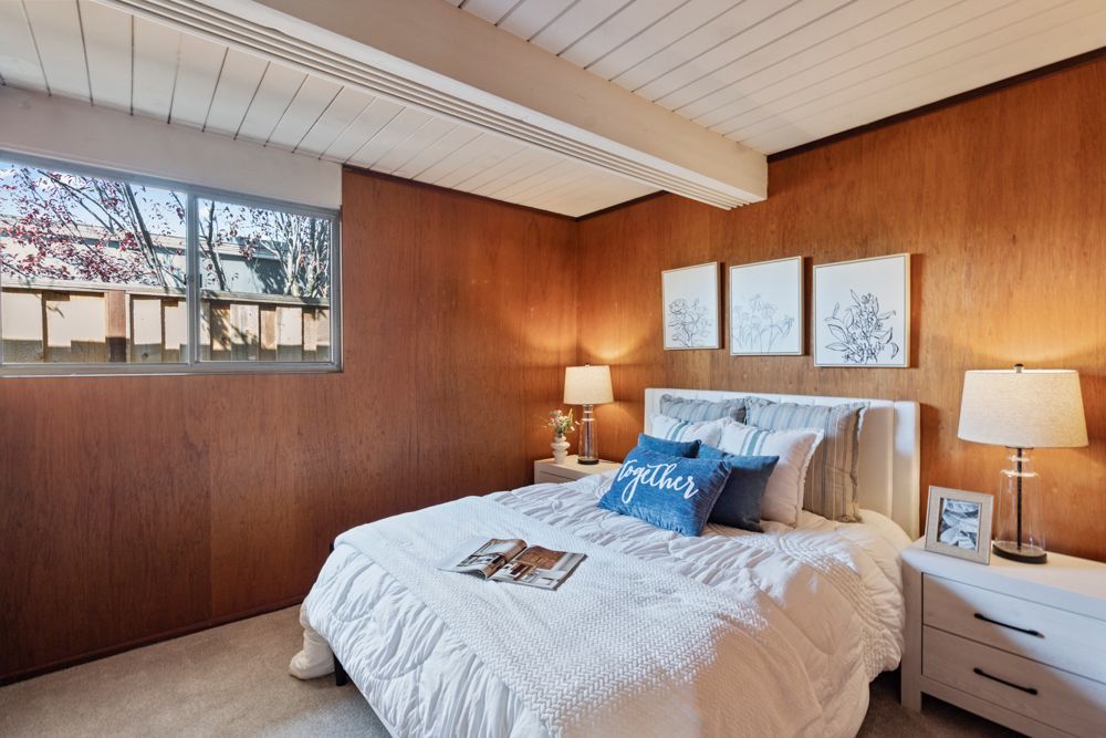 Comfortable bedroom with closet storage and natural light, presented by Rumana Jabeen & Associates to showcase practical layouts buyers seek and sellers can market with confidence.