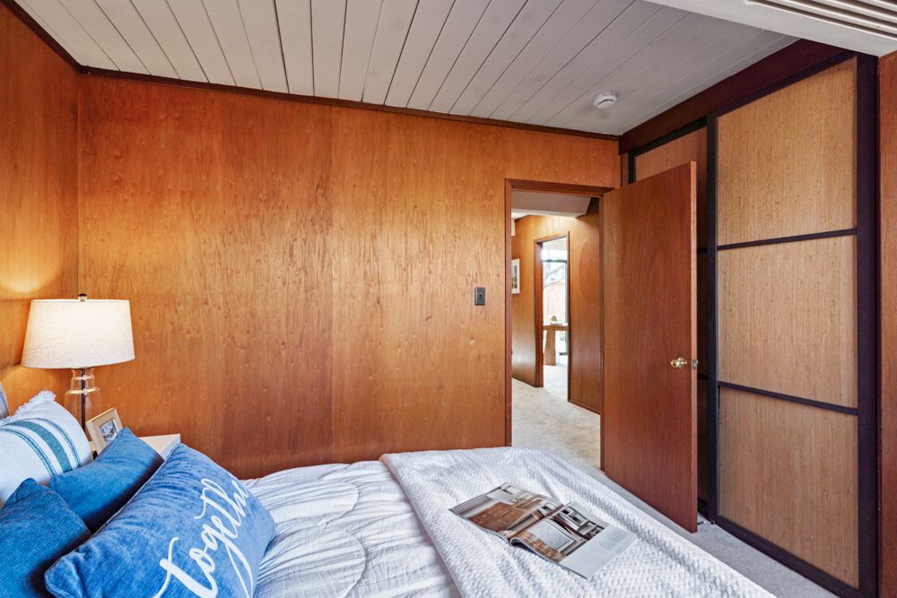 Comfortable bedroom with closet storage and natural light, presented by Rumana Jabeen & Associates to showcase practical layouts buyers seek and sellers can market with confidence.