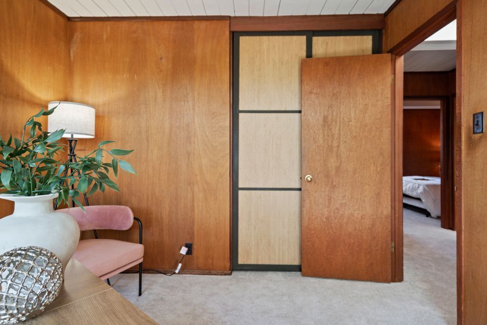 Versatile bedroom with patio access and outdoor connection, shown by Rumana Jabeen & Associates to appeal to buyers who value lifestyle and reassure sellers of market appeal.