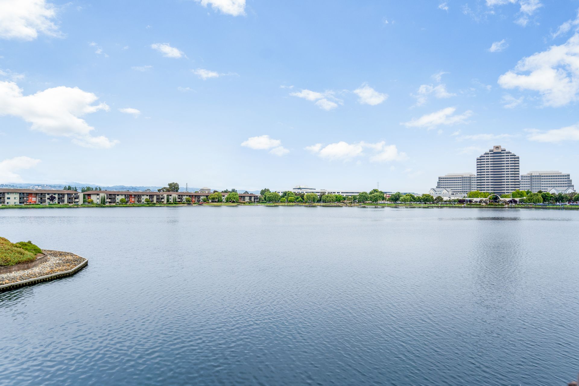 A large body of water with a city in the background.