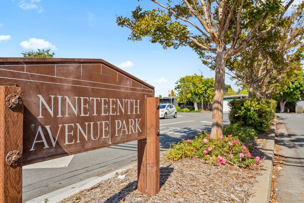 Nineteenth Avenue Park with lawns and play structures, showcased by Rumana Jabeen & Associates to inspire buyers looking for nearby amenities and assure sellers of full community representation.