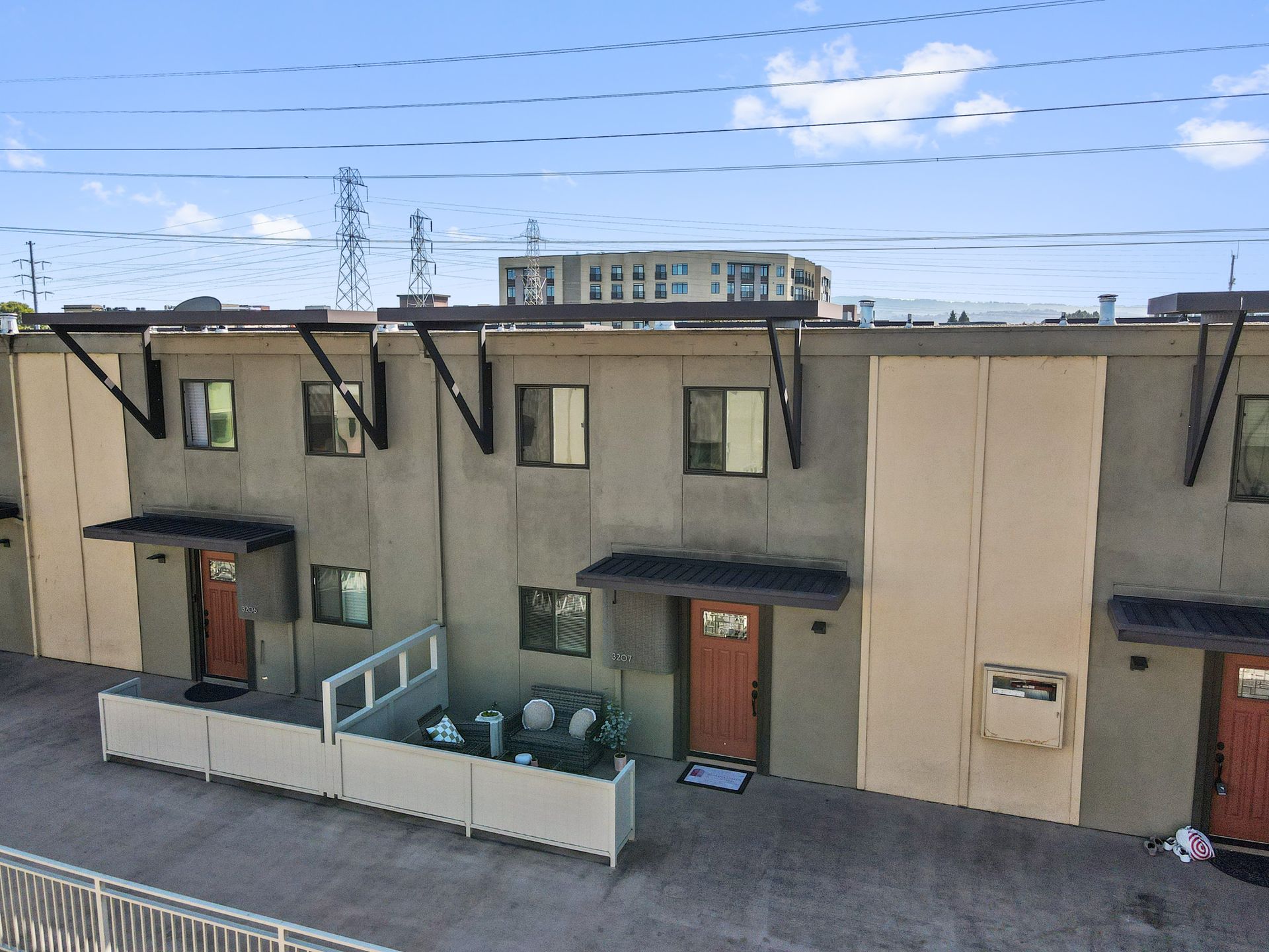 An aerial view of a row of apartment buildings