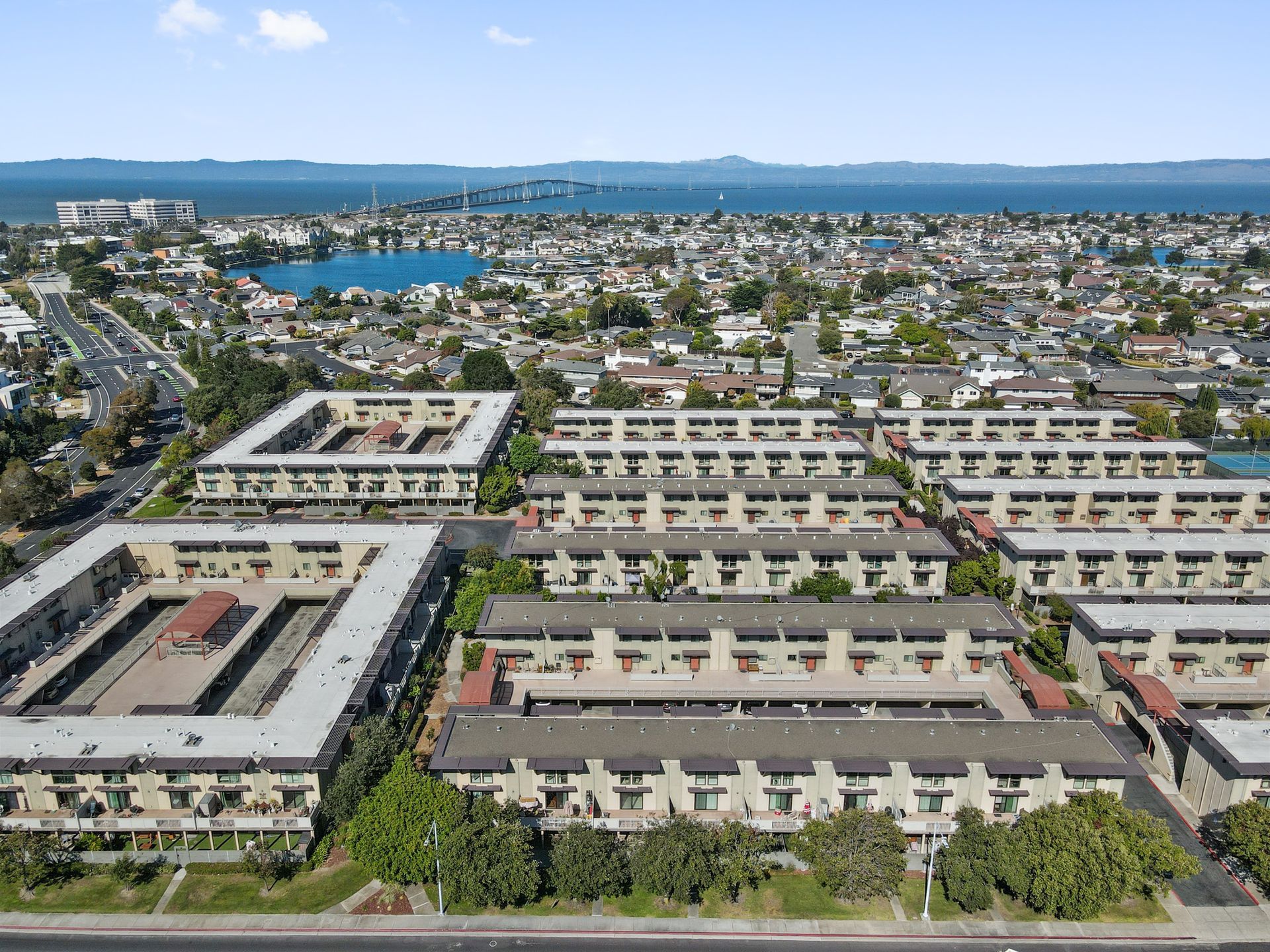 An aerial view of a city with a lot of buildings and trees.