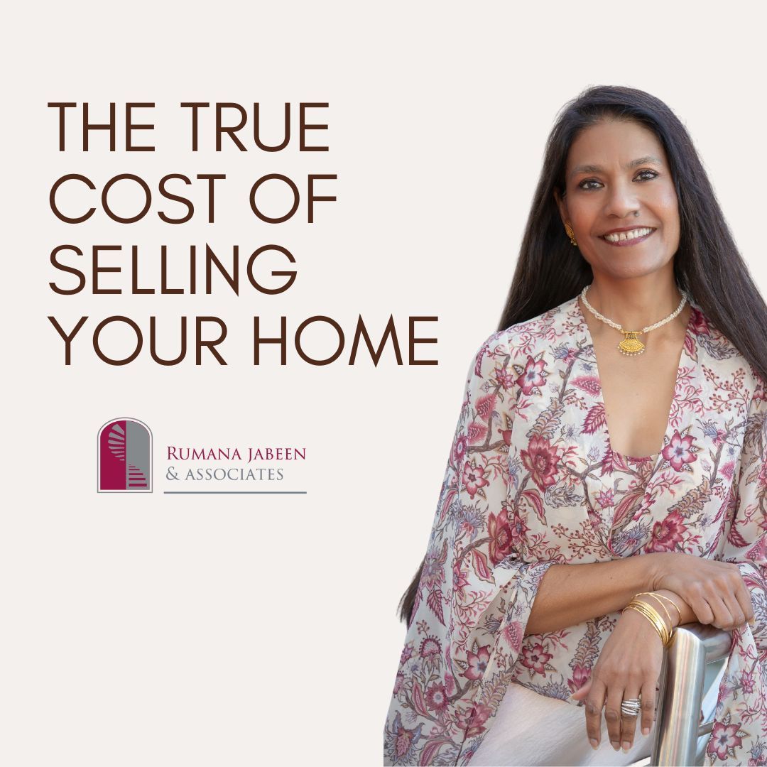 A woman is sitting on a chair in front of a sign that says the true cost of selling your home.