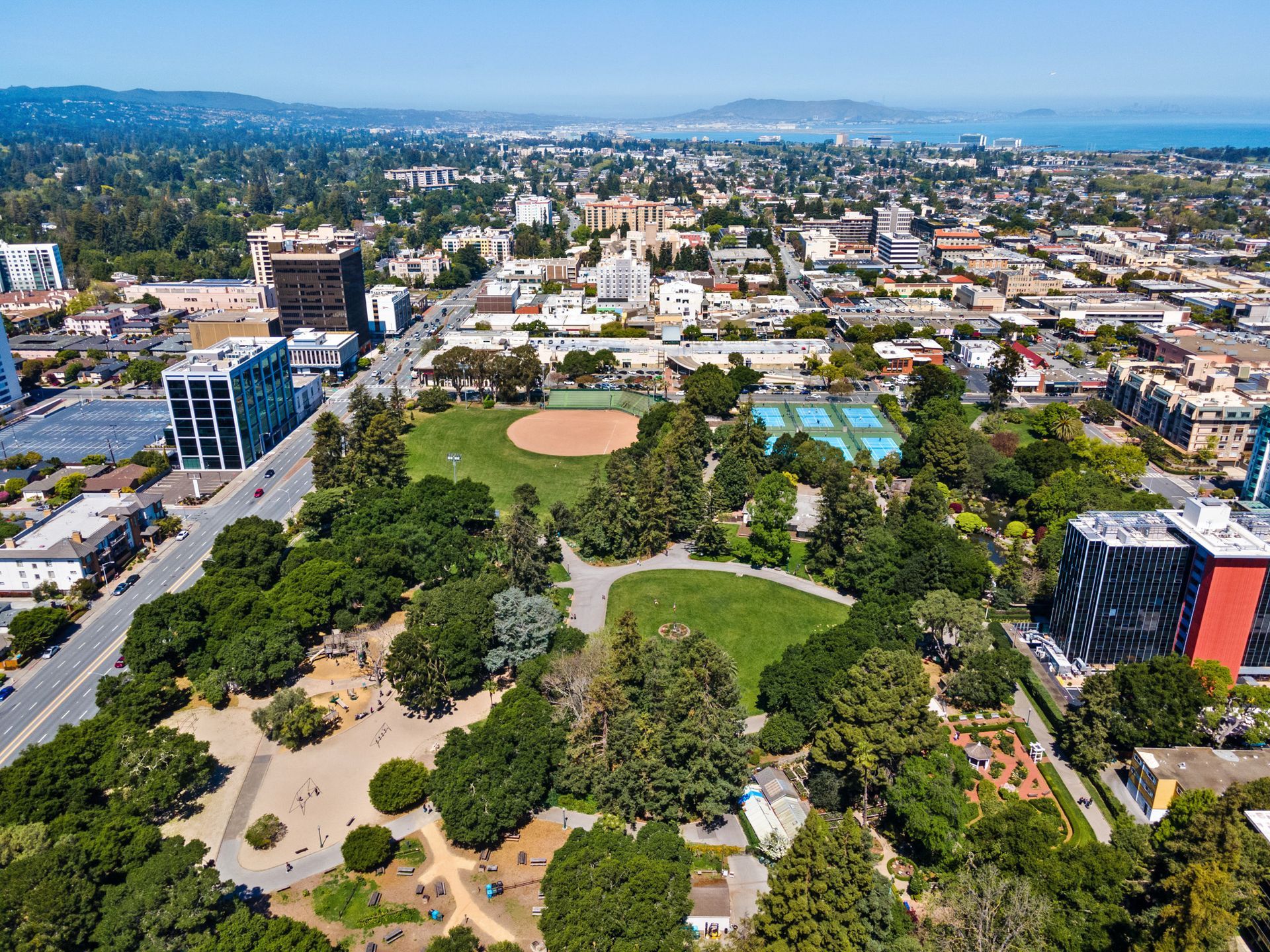 An aerial view of a park in the middle of a city.