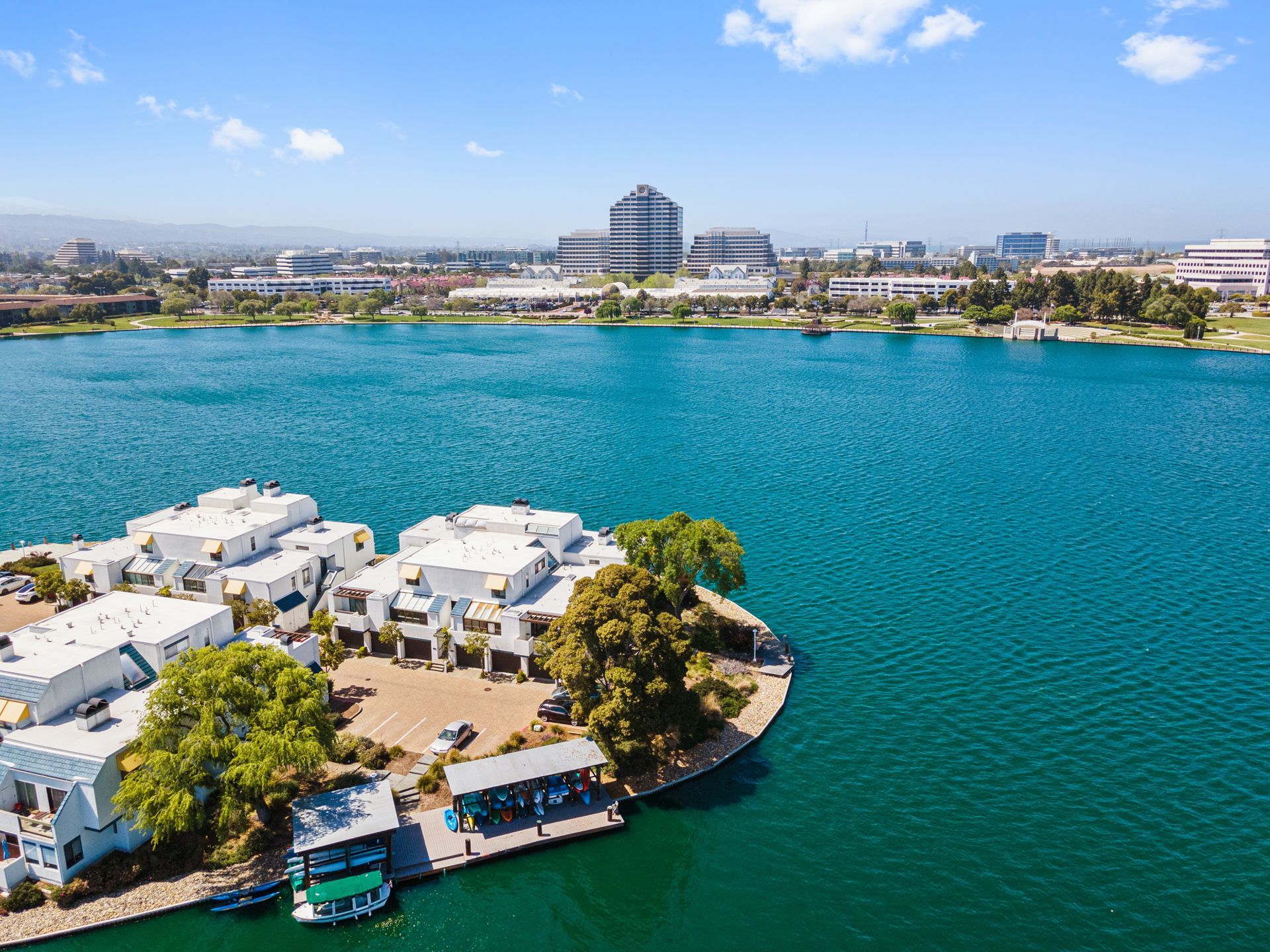 An aerial view of a small island in the middle of a large body of water.