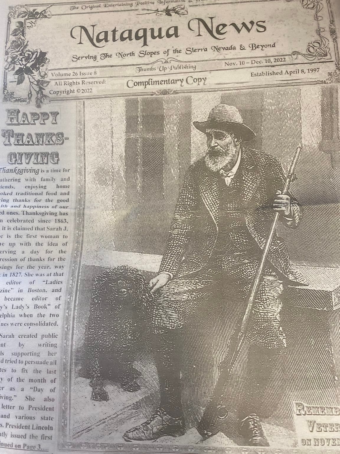 A black and white photo of a man on the front page of a newspaper