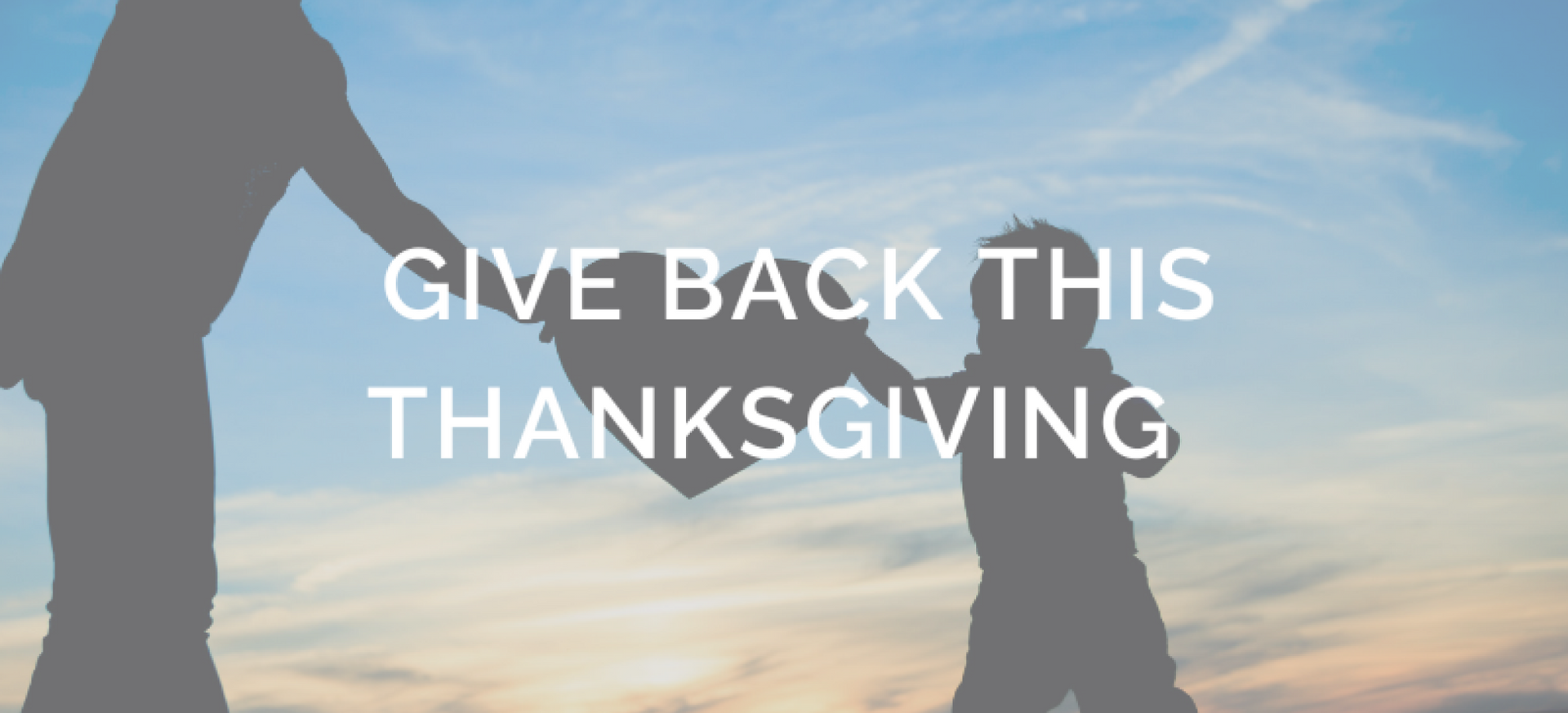 A silhouette of a man and a child holding hands with the words `` give back this thanksgiving ''.