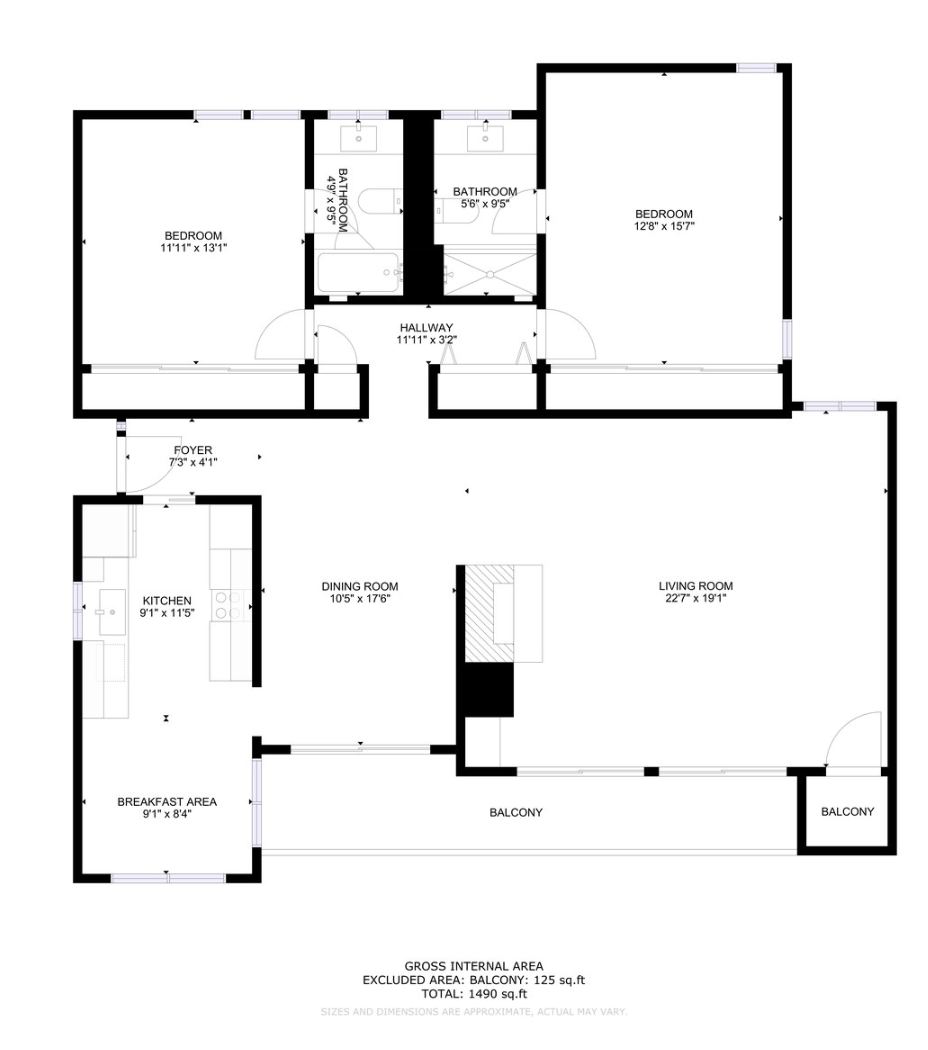 A black and white floor plan of a house with a balcony.
