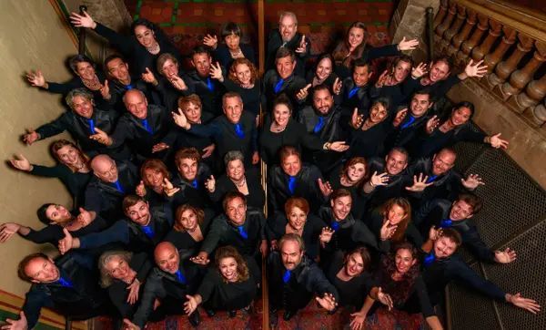 A large group of people are posing for a picture.