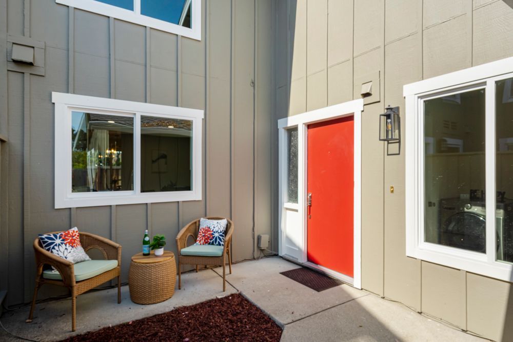 Welcoming entry patio with fresh landscaping, ideal curb appeal in Foster City’s Harborside community, listed with Rumana Jabeen Real Estate.