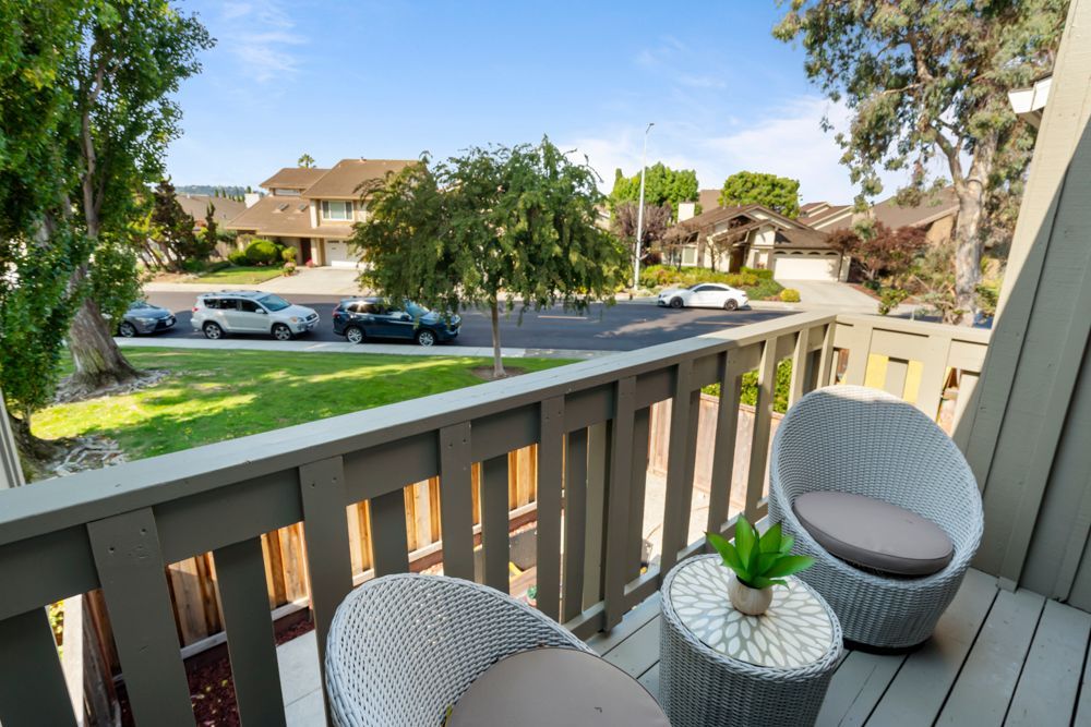 Primary suite balcony offering a quiet outdoor retreat with peek-a-boo Peninsula views, presented by Rumana Jabeen Real Estate.