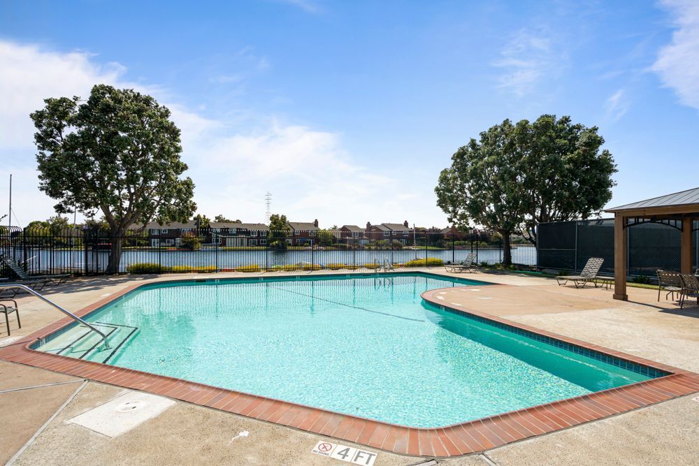Resort-style Harborside amenities including pool, tennis courts, listed by Foster City Realtor Rumana Jabeen.