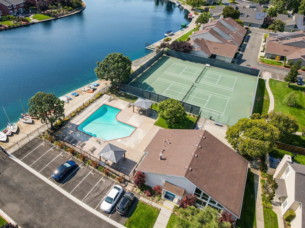Resort-style Harborside amenities including pool, tennis courts, listed by Foster City Realtor Rumana Jabeen.
