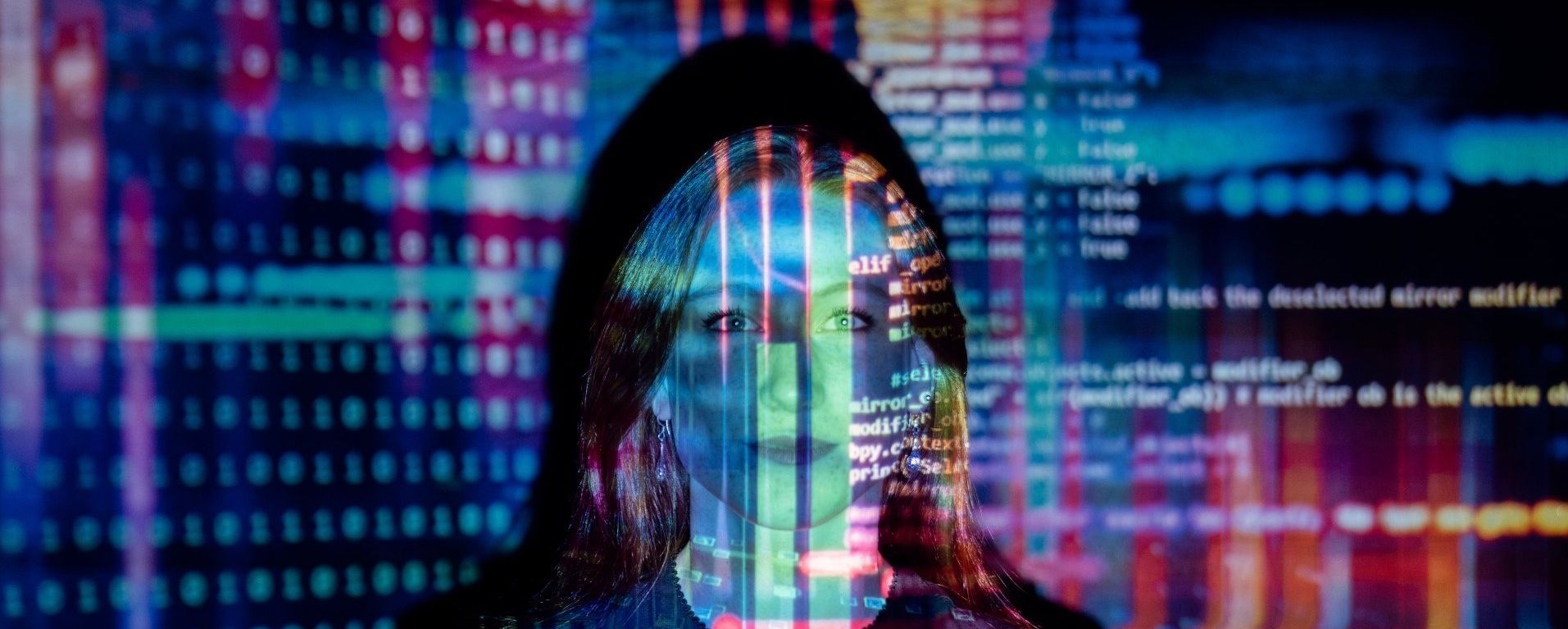 A woman in a room with a computer code displayed across her face