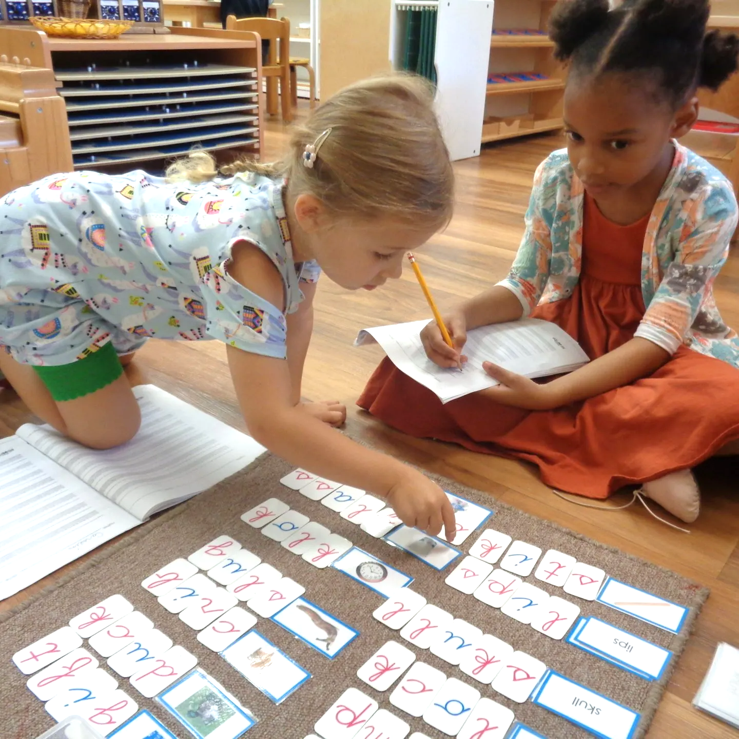 Children working with Montessori Materials