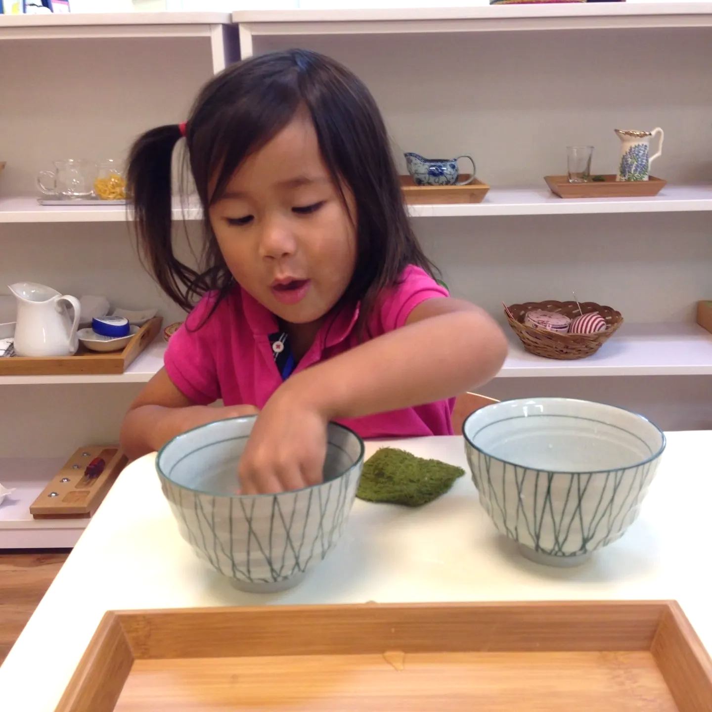 Child working with Montessori Materials