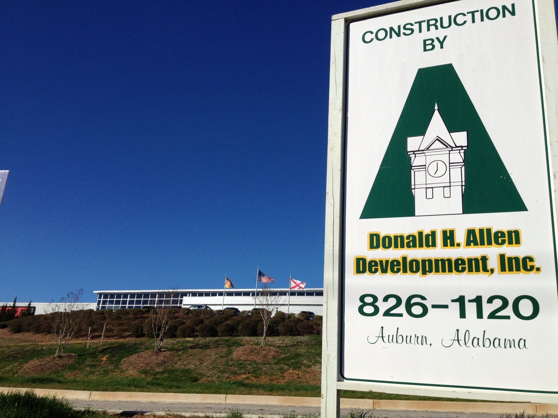 Donald H Allen Development, Inc. logo on a sign