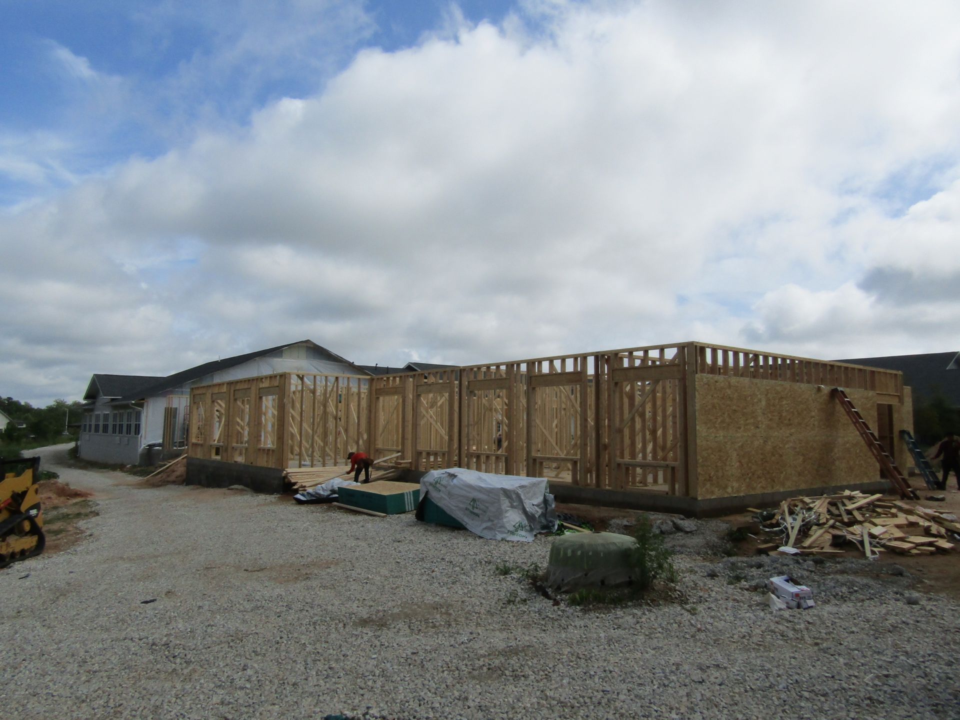A business is being built in a gravel lot