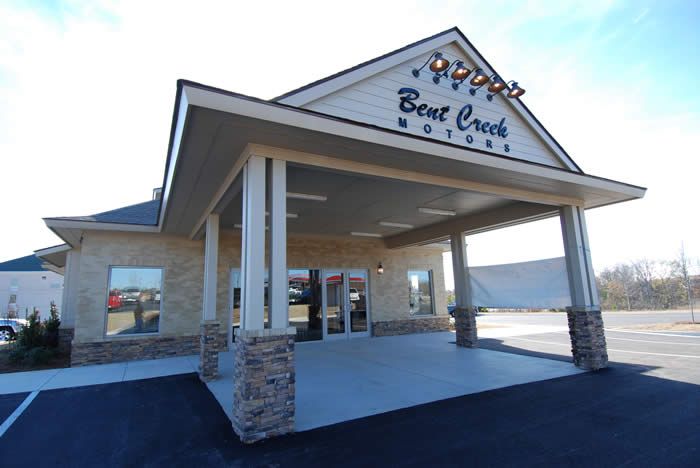 A large building with the name bent creek on it