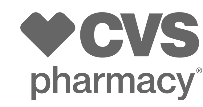 The cvs pharmacy logo is black and white with a heart.
