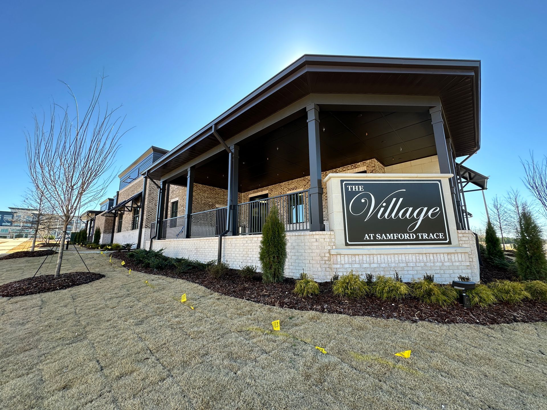 A building with a sign that says the village on it