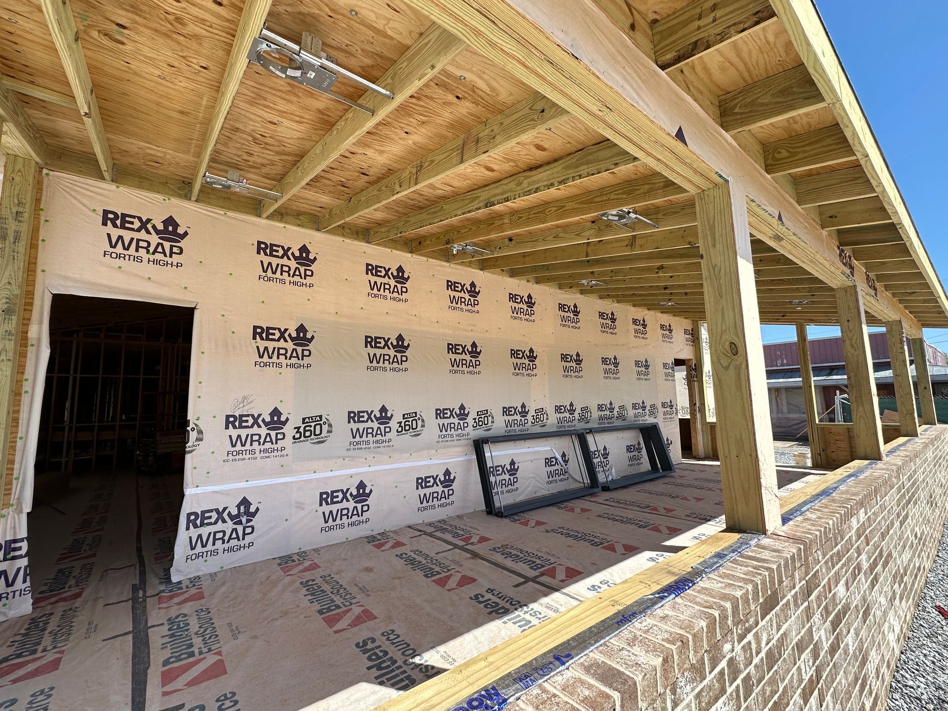 A building under construction with a lot of insulation on the walls.