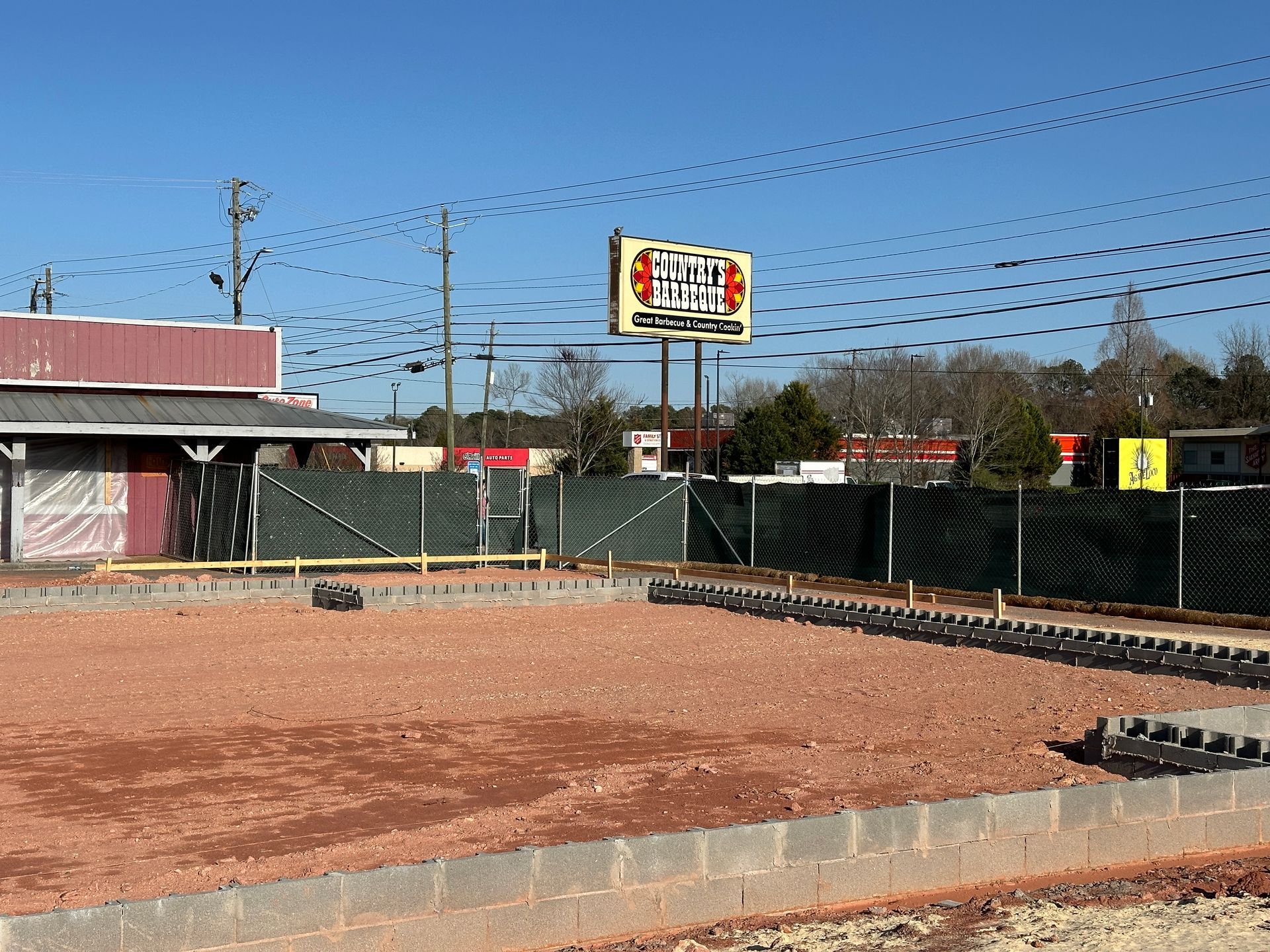 A fenced in area with a sign that says ' texas ' on it