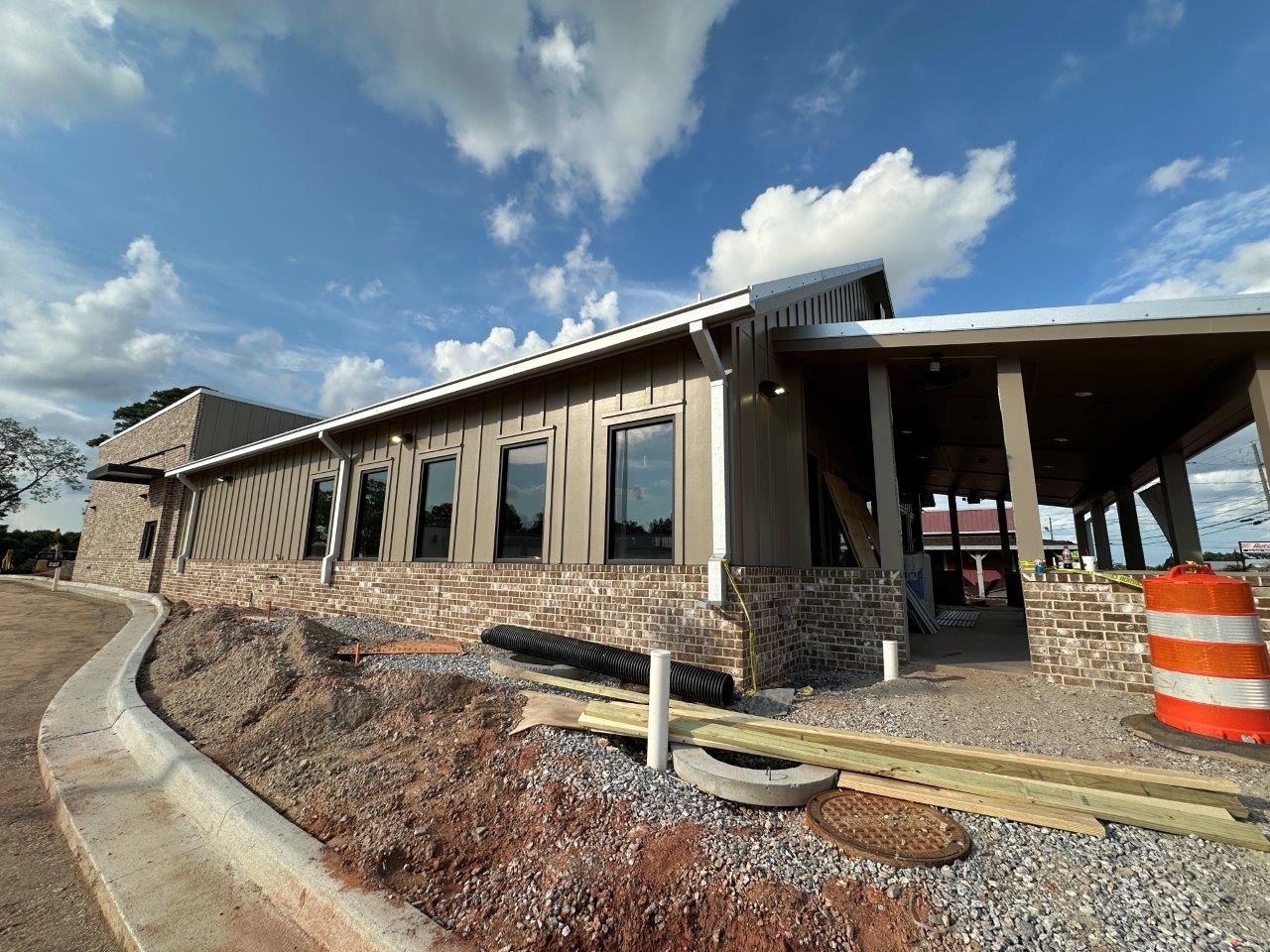 A large building with a lot of windows is being built.