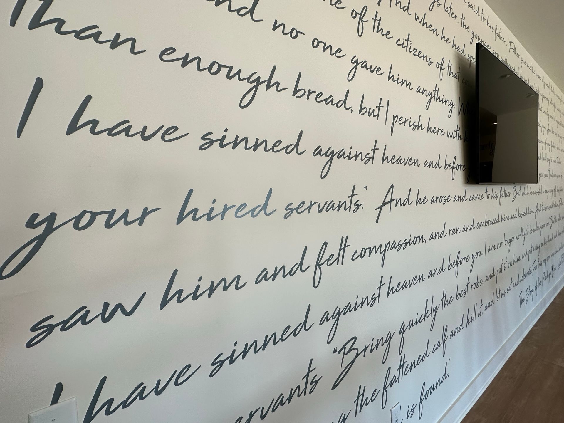 A wall with a quote that says i have sinned against your hired servants