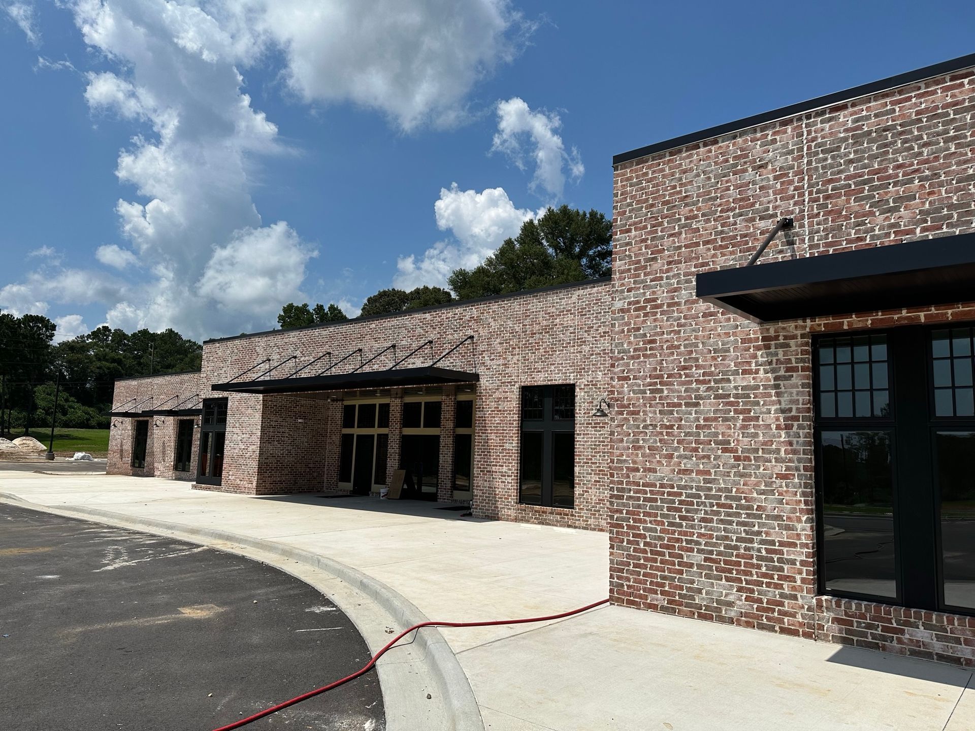 A large brick building with a lot of windows