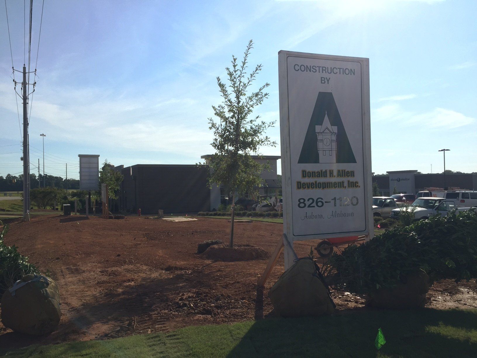 A sign that says construction of on it