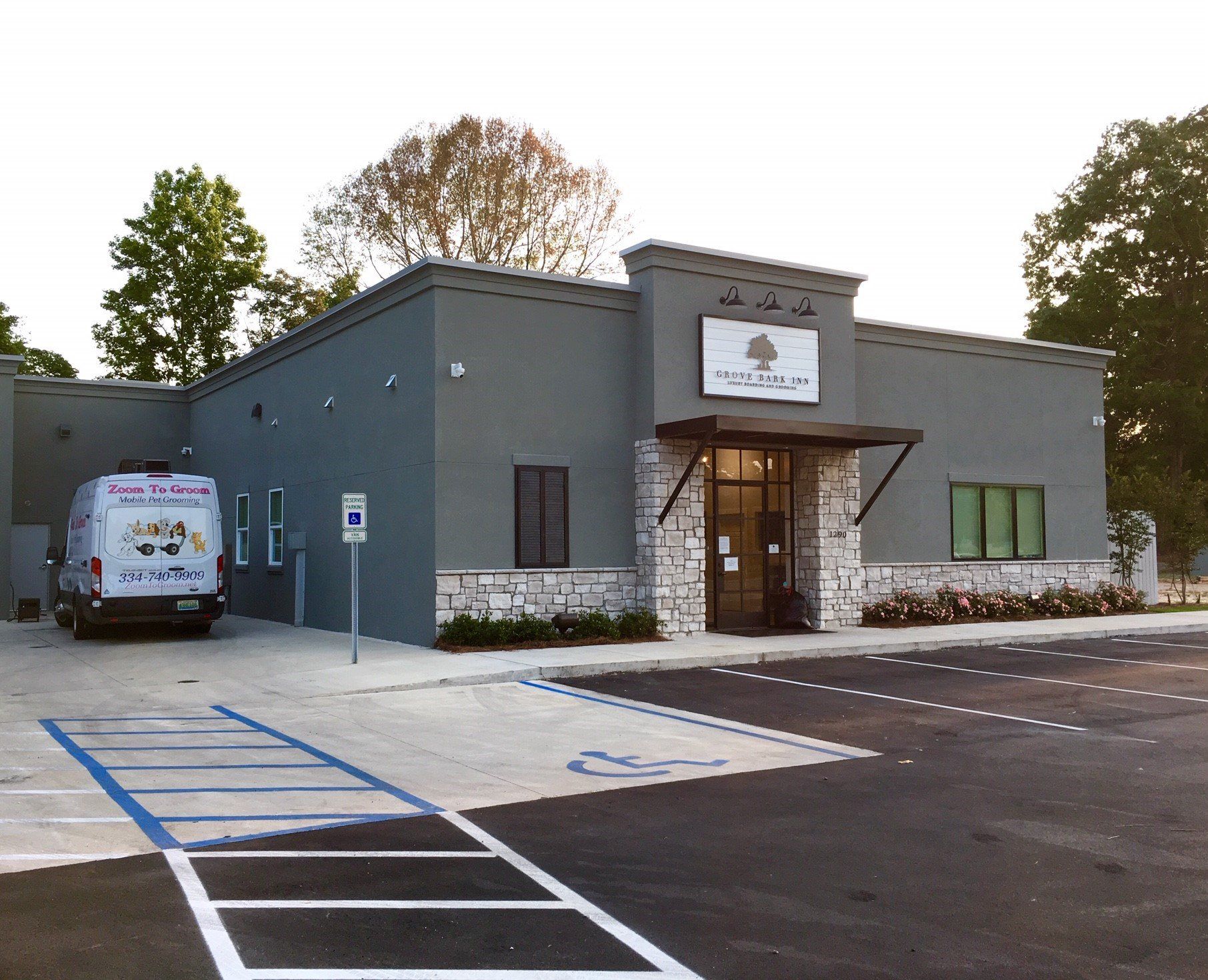 A building with a van parked in front of it
