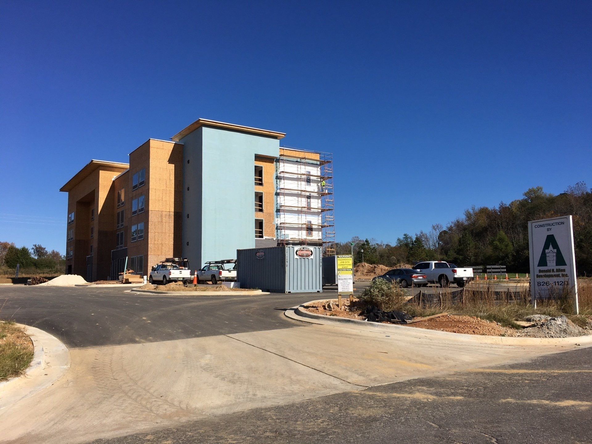 A large building with a sign that says a on it
