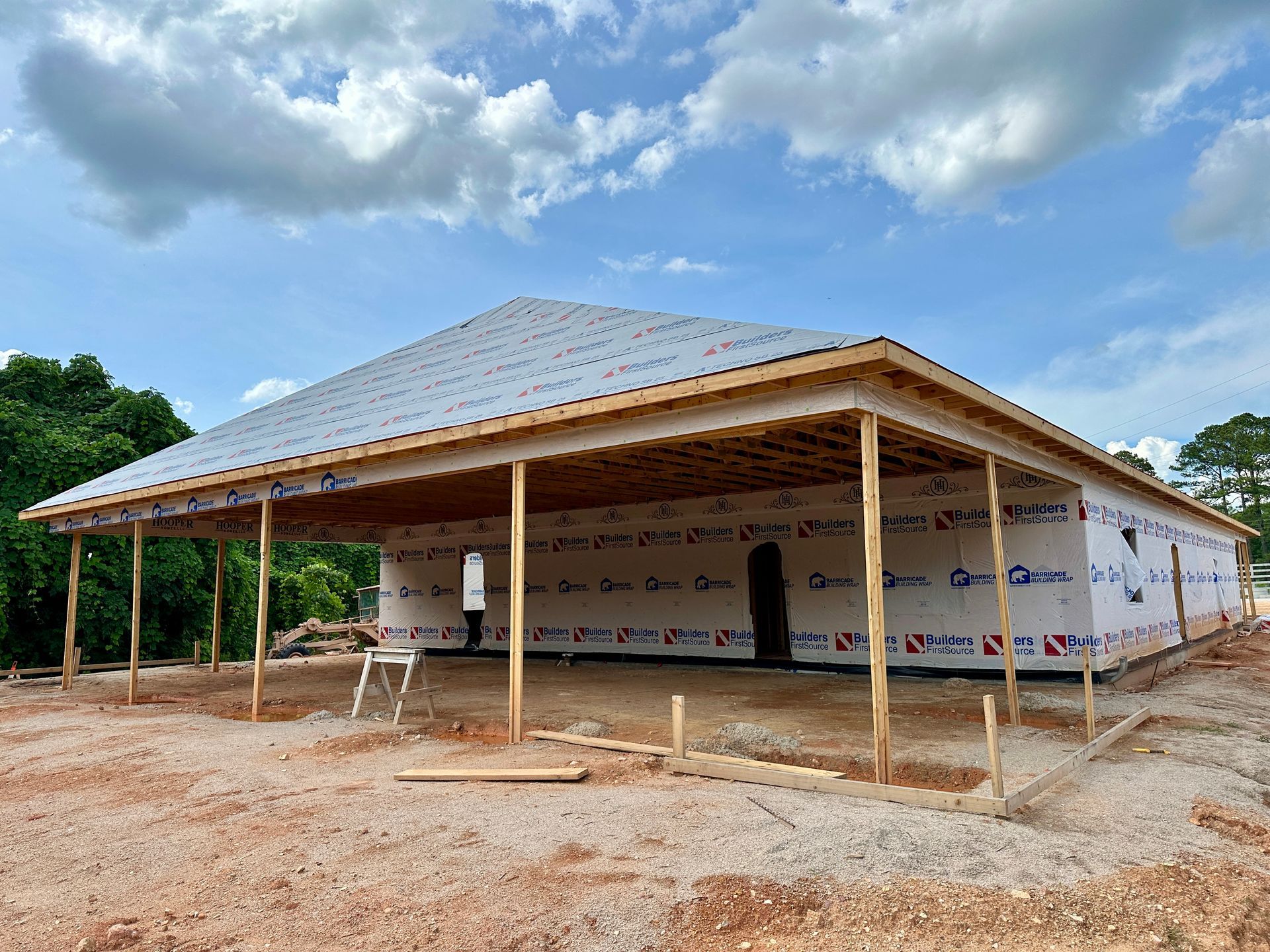 A house is being built with a metal roof