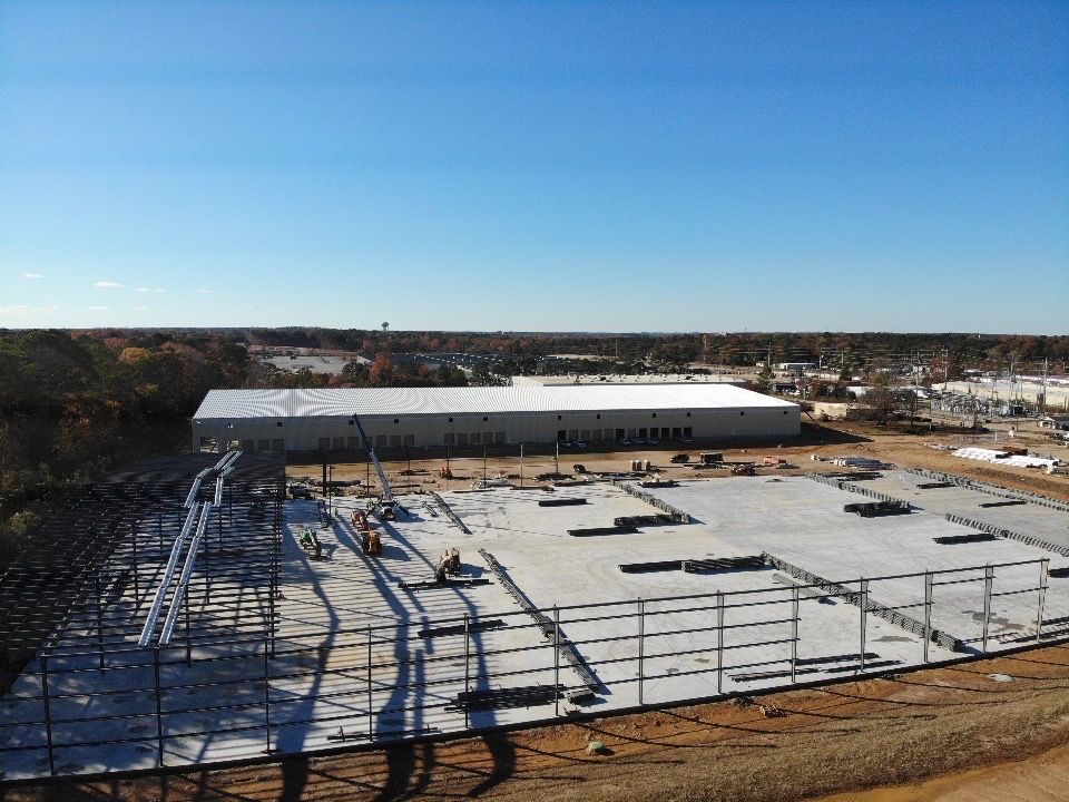 An aerial view of a large building under construction