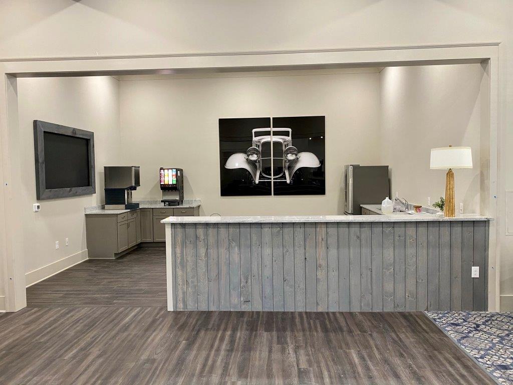 There is a large counter in the middle of the room.